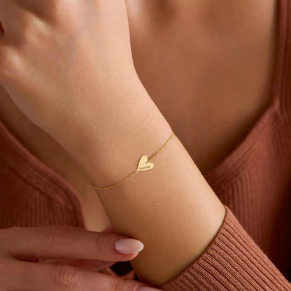 Pulsera personalizada con corazón grabado